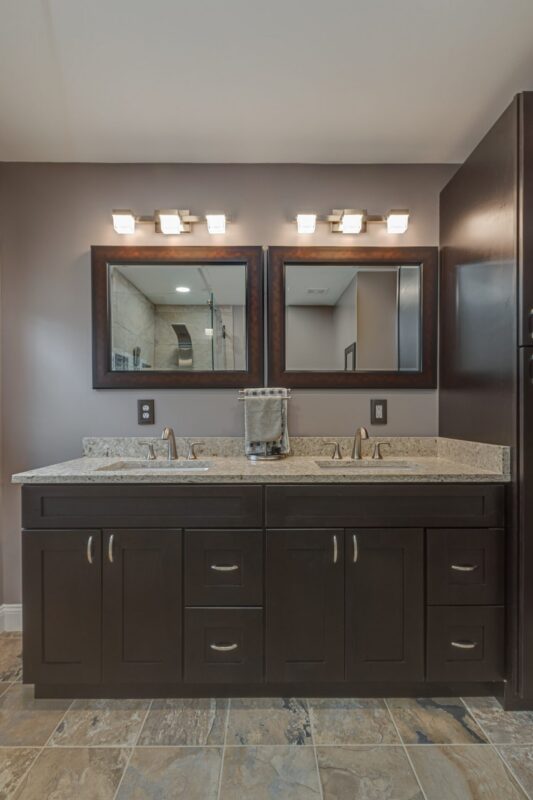 Espresso double vanity with granite top and twin mirrors